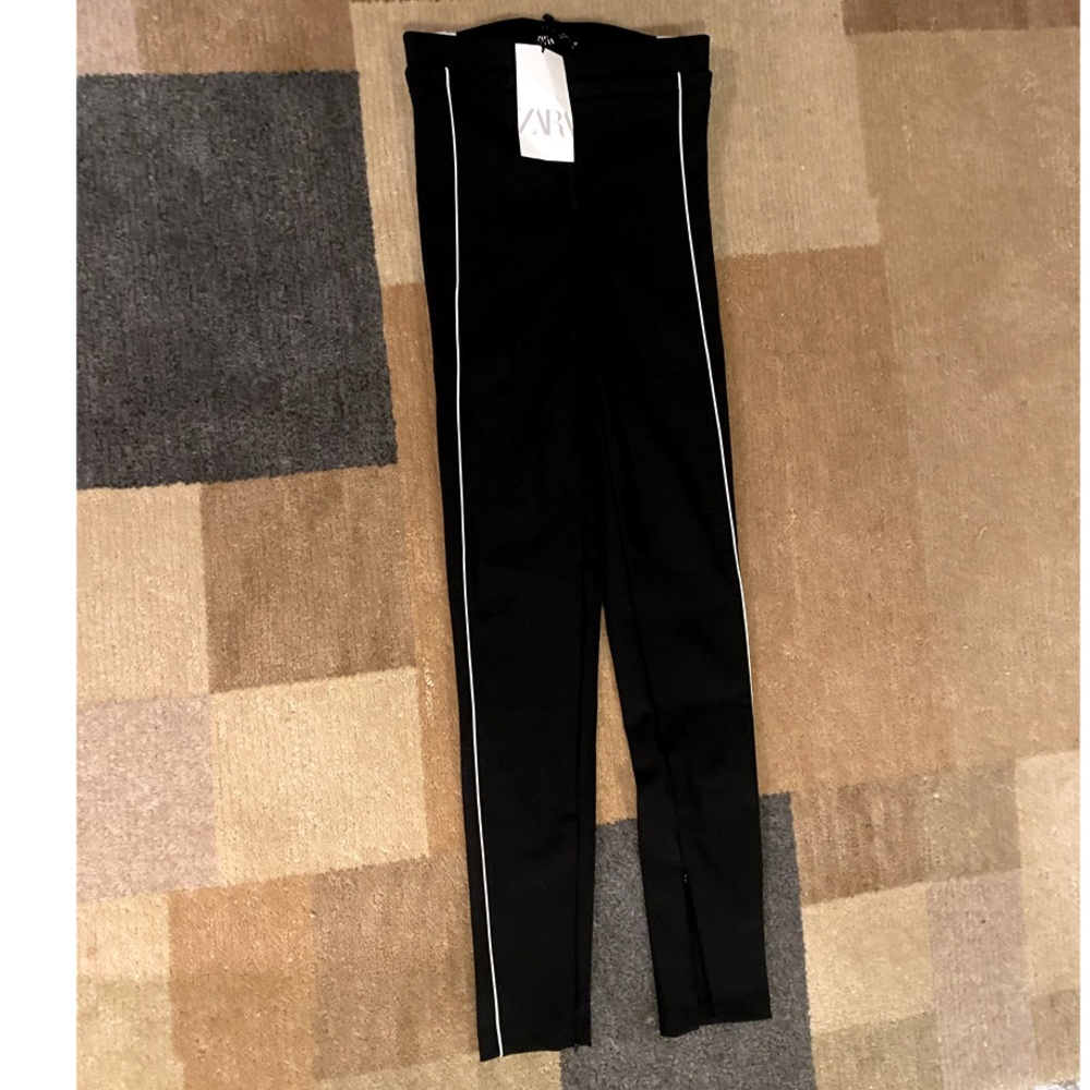 Zara Tech Leggings in black with a white stripe. Zip bottom. Size Small NWT